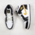 Air Jordan 1 Mid Patent Black/White/Gold na internet