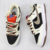 Dunk Low Bege/Preto/Orange na internet
