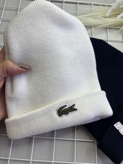 TOUCA MODAL LACOSTE VESTE 2 anos a 16 na internet