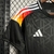 Camisa de futebol masculina da Alemanha, edição especial Black 24/25 da Adidas, destacando detalhes em vermelho, laranja e preto.