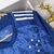 Camisa azul do Cruzeiro I 24/25 Torcedor Adidas Masculina, com detalhes em estrelas e listras brancas nos ombros.