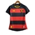 Camisa feminina de futebol da Umbro, modelo Sport I 23/24, nas cores preta e vermelha, com listras horizontais e logo da marca.