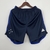 Shorts Cruzeiro Home 23/24 na cor azul, com detalhes em branco e azul nas laterais.