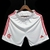 Shorts do Flamengo Home 23/24 em branco com detalhes em vermelho e logo do clube.