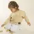 BUZO FRISA OVERSIZE OLI BEIGE - Iris Indumentaria