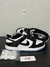 Imagem do NIKE DUNK LOW PRETO E BRANCO SOLA AZUL