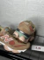 NEW BALANCE 9060 MARROM E CORAL - LN A FONTE