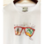 Remera The Beach -Blanco- en internet