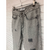Imagen de Jean Regular Rigido Roturas -Gris-