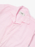 Camisa boxy listrada rosa de 100% algodão popeline, apresentando listras brancas e etiqueta KMZ.