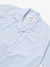 Camisa boxy xadrez azul bebê com gola clássica e botões frontais, da marca KMZ.