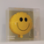 Balão smiley na caixa