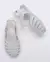 Chinelo infantil feminino branco transparente com glitter, modelo rasteira da marca Melissa.