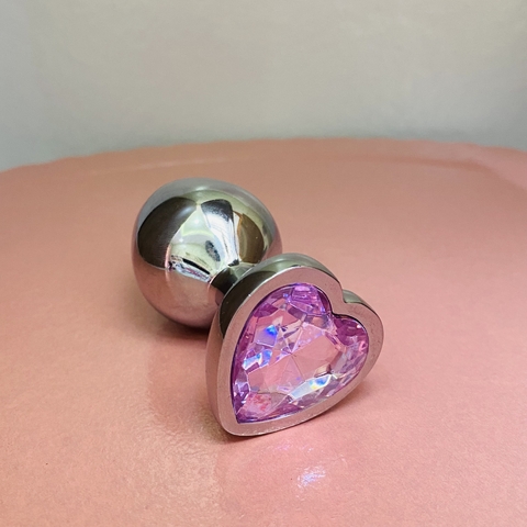 Plug anal de metal com base em formato de coração e pedra rosa brilhante