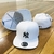 Bone NY Yankees Aba Reta Fechado Branco / Preto - comprar online