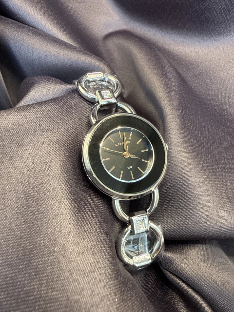 Relógio lince fundo preto - comprar online