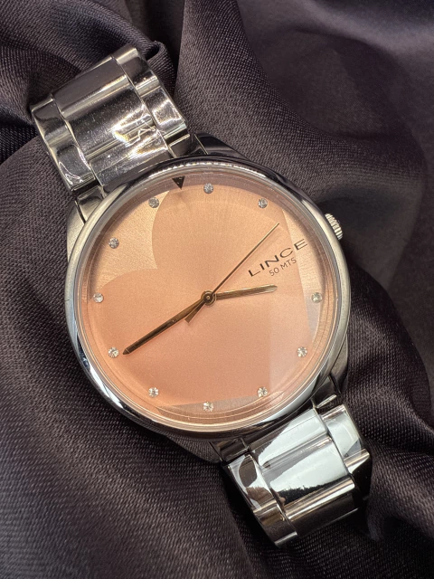 Relógio lince fundo rosa - comprar online