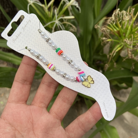 Tobillera mariposa beige