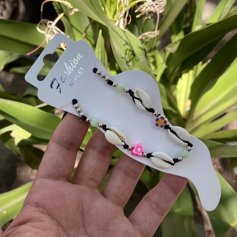 Tobillera caracol con flor negra