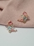 Brinco cravejado com pedras coloridas na internet