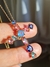 Colar crucifixo com pedras cravejadas na internet
