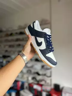 Nike dunk azul y blanca con suela caramelo