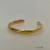 Bracelete Dourado Torcido Ajustável