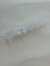 Imagem do Persex de Renda com detalhe de laço