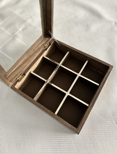 Caja de té o alhajero de madera y alpaca de 9 divisiones en internet