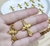 APLIQUE MINI CRUCIFIXO DOURADO - 5 unidades