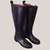 Botas de montar de cuero negro con detalle de tejido elástico en los laterales y suela de goma.