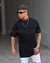 Remera Over Officer negro - Ilcapitanosantafe