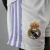 camisa-infantil-real-madrid-2022-22-23-vini-jr-branca-polo-roxo-champions-rodrygo-home-1-i-titular-