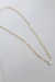 Colar Aunitie com Elos Cartier Em prata 925 com banho de ouro amarelo 18k e detalhe em ponto de luz com pedra incolor. na internet
