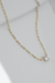 Colar Aunitie com Elos Cartier Em prata 925 com banho de ouro amarelo 18k e detalhe em ponto de luz com pedra incolor. - loja online
