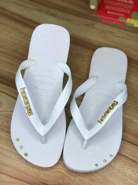 HAVAIANAS TOP BRANCO + PEDRARIA + PLACAS DOURADO - comprar online