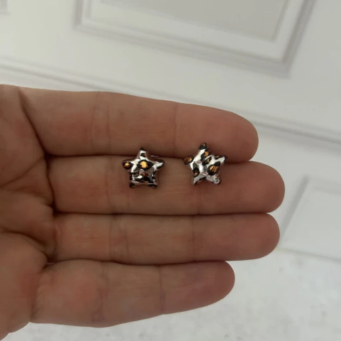 Aros estrella animal plateada - comprar online