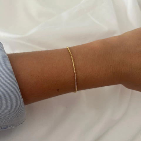 Pulsera de acero dorado