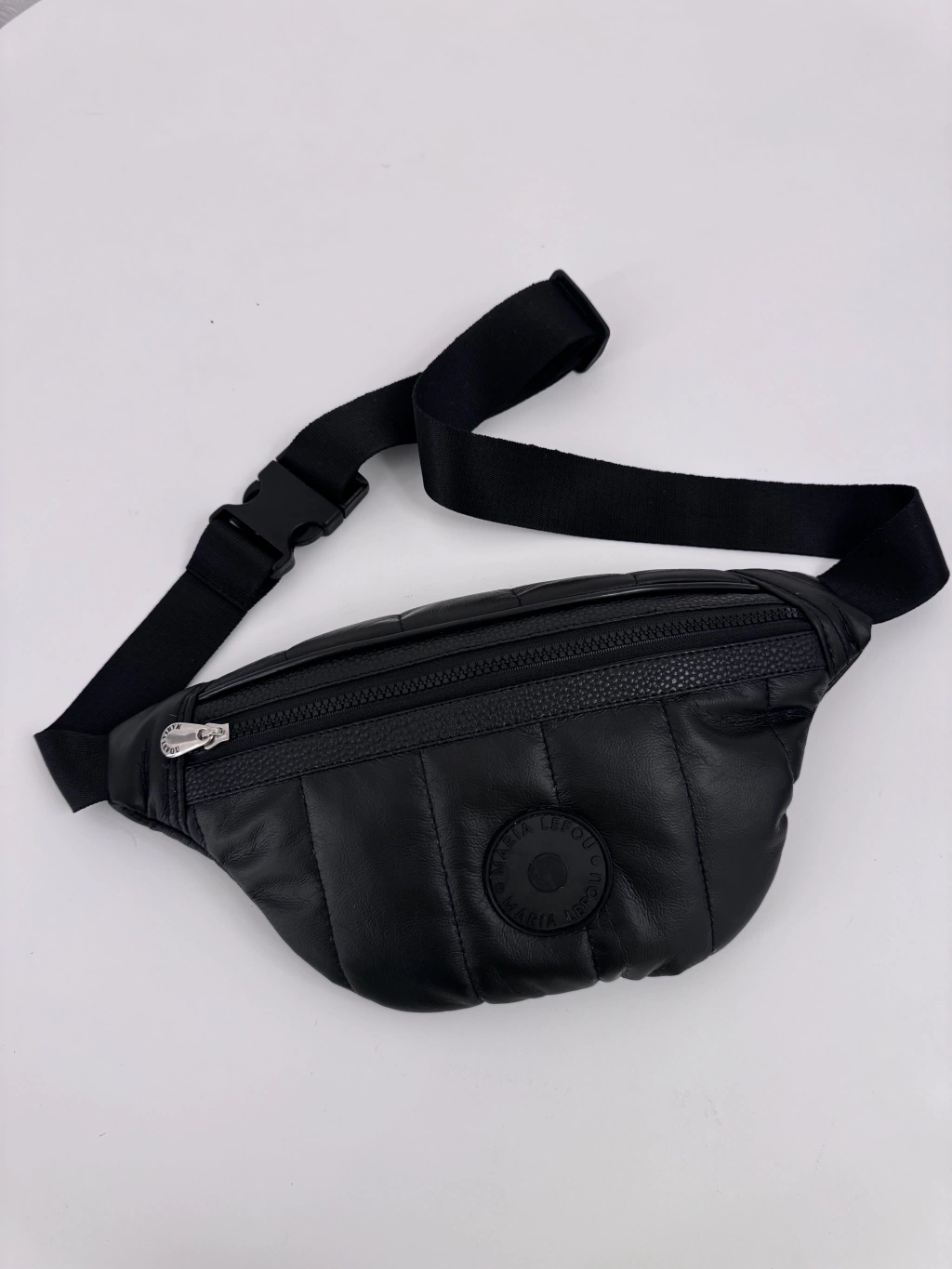 riñonera puffer negra nuevo logo
