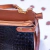 Bolsa Genova Tiracolo e Mão Grande Couro Preto e Marrom - LEONEH