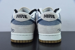 Imagem do Tênis Nike Dunk Low SB Santa Claus
