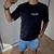 Remera oversize doble estampa Warning negra - tienda online