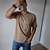 Remera oversize doble estampa Warning marron en internet