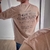 Remera oversize doble estampa Warning marron - comprar online