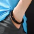 Brazalete de Cuero Trenzado Negro con Ojo de Tigre - comprar en línea