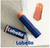 LABELLO® Bálsamo Labial Caring Beauty (4.8 g), Color Intenso y Cuidado Duradero con Vitamina E Nude - Styla