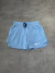 BERMUDA NK TACTEL MAURICINHO SWOOSH - AZUL CLARO - comprar online