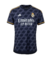 Real Madrid 2023-2024, Camisa reserva Real Madrid, Adidas azul marinho, Estampa ondulada, Uniforme de visitante, Kit Real Madrid away, Detalhes em amarelo e roxo, Camisa de futebol elegante, Novidades do Real Madrid, Futebol espanhol