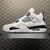 Side view of Air Jordan 4 "Fear" sneakers in white and black colorway, showcasing its design and details.