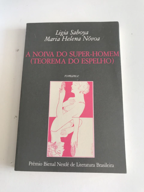 SABOYA, Ligia; NÓVOA, Maria Helena. A noiva do super-homem (teorema do espelho)